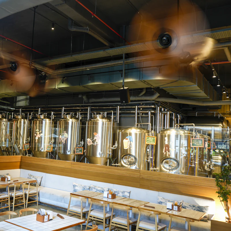 The taproom with tables and tanks